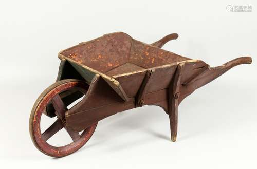 A CHILD'S WOODEN, ANTIQUE BARROW. 29ins long