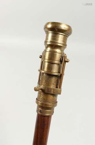 A BONE WALKING STICK 'COMPASS'