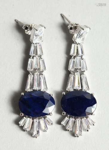 A PAIR OF SILVER LARGE SAPPHIRE DROP EAR RINGS