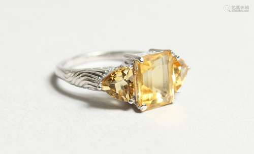 A SILVER AND CITRINE RING