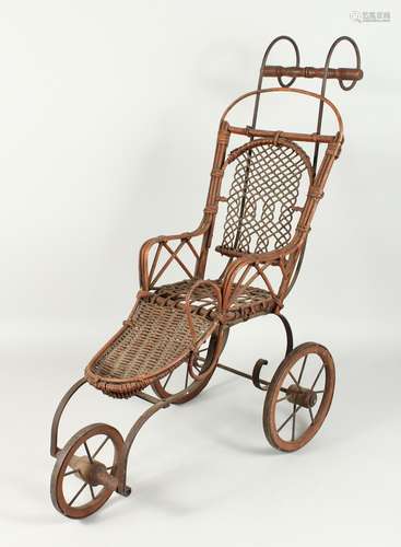 A CHILD'S VICTORIAN CANE DOLL'S PRAM