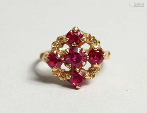 AN 18CT GOLD FIVE STONE RUBY CLUSTER RING