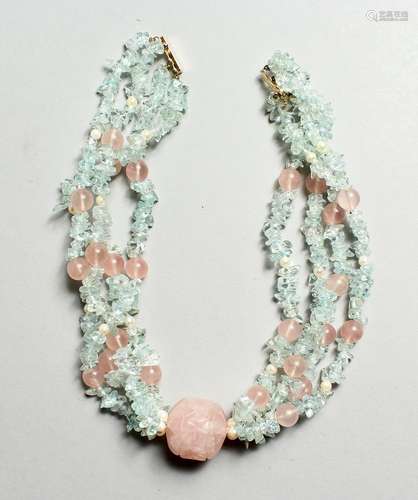 A FOUR ROW QUARTZ AND AQUAMARINE NECKLACE with gold clasp