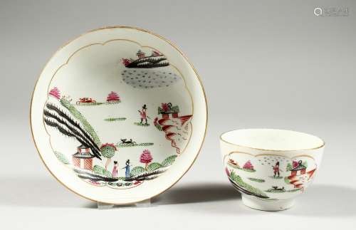 A WORCESTER SEMI-HARD PASTE TEA BOWL AND SAUCER, painted wit...