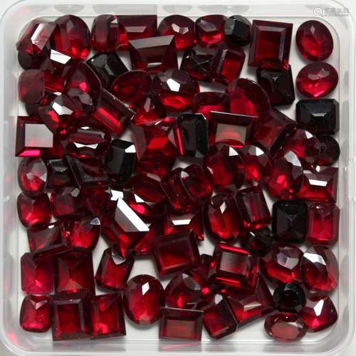 A BOX OF GARNET STONES