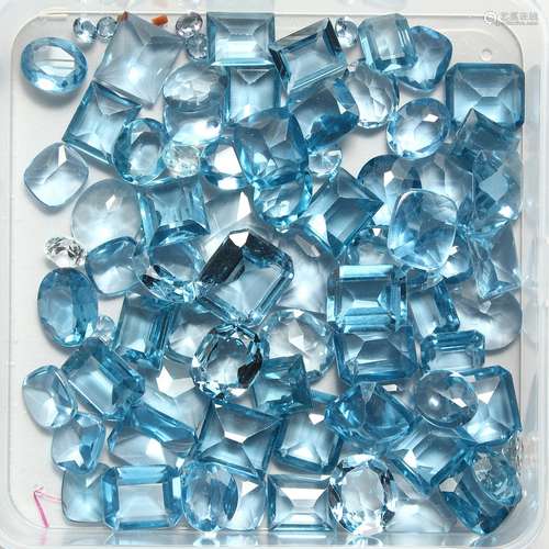 A BOX OF AQUAMARINE STONES