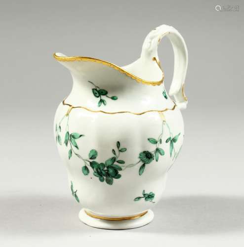 A BRISTOL MILK JUG OF OGEE FORM, with painted green swags.