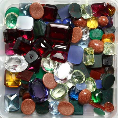 A BOX OF MIXED STONES