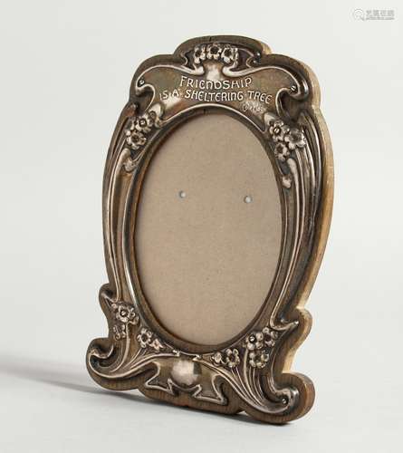 AN ART NOUVEAU SILVER PHOTOGRAPH FRAME, 'Friendship is a she...