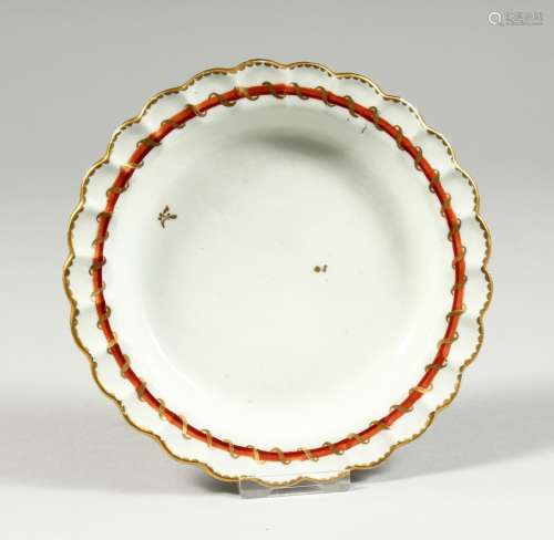 A BRISTOL SMALL PLATE decorated with two random leaves, a bu...