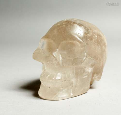 A ROCK CRYSTAL SKULL 4ins high