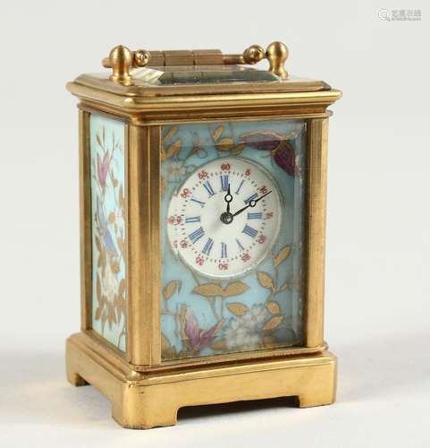 A MINIATURE SEVRES CARRIAGE CLOCK with flora porcelain panel...