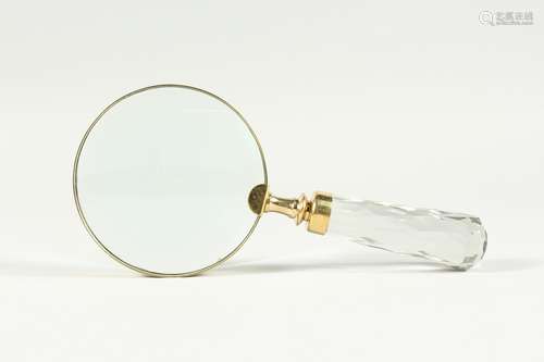 A MAGNIFYING GLASS WITH CUT GLASS HANDLE