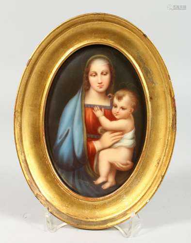 A GOOD OVAL PORCELAIN PLAQUE Madonna and child, in a gilt fr...