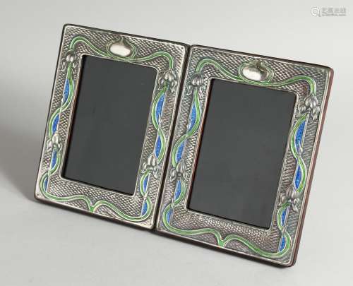 A PAIR OF ART NOUVEAU STYLE SILVER AND ENAMEL PHOTOGRAPH FRA...