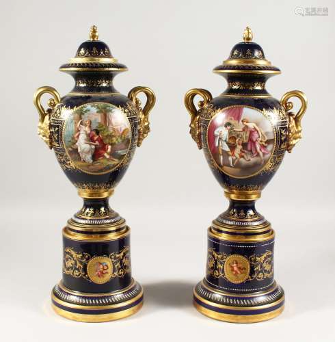 A SUPERB PAIR OF VIENNA VASES, COVERS AND STANDS, the rich b...