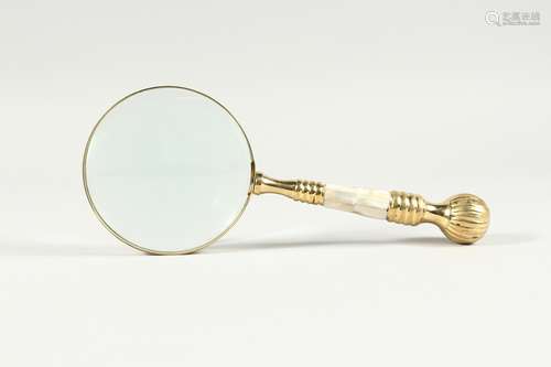 A MAGNIFYING GLASS WITH MOTHER OF PEARL AND GILT HANDLE