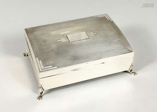 AN ENGINE TURNED SILVER TABLE CIGARETTE BOX with cedar wood ...