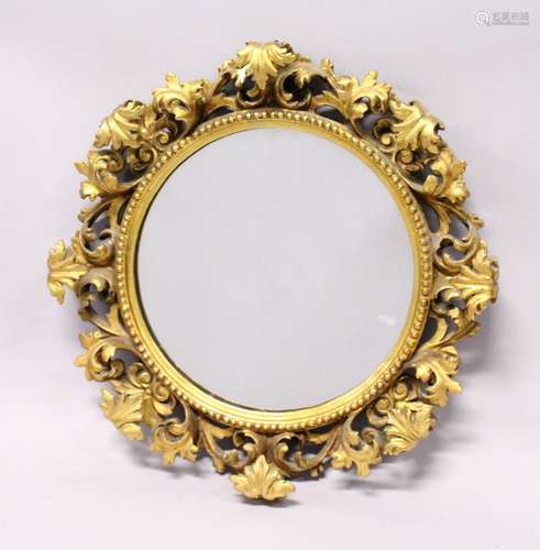 A GOOD 19TH CENTURY FLORENTINE GILT FRAMED CIRCULAR MIRROR, ...