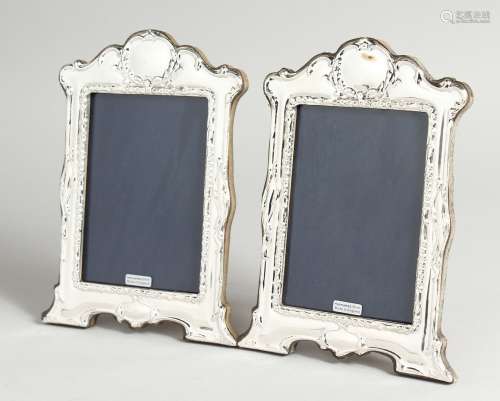 A PAIR OF SILVER PHOTOGRAPH FRAME 7.5 x 5.5ins