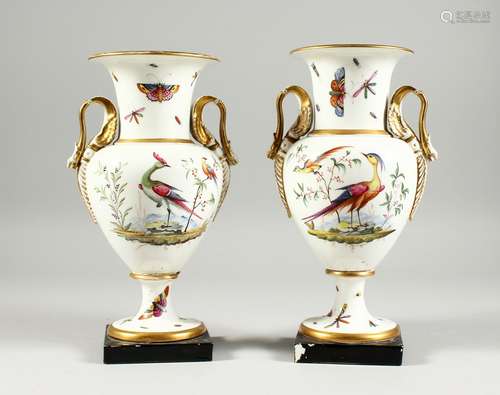 A GOOD PAIR OF FRENCH PORCELAIN TWO HANDLED VASES, painted w...