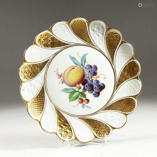 A GOOD MEISSEN SWIRLING GILDED PLATE, the centre painted wit...