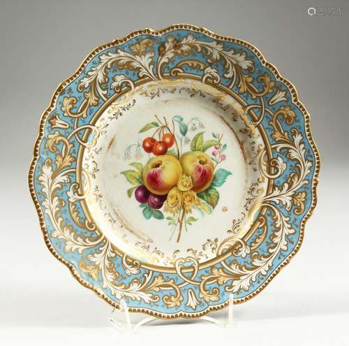 AN ENGLISH PORCELAIN PLATE, light blue and gilt border, the ...