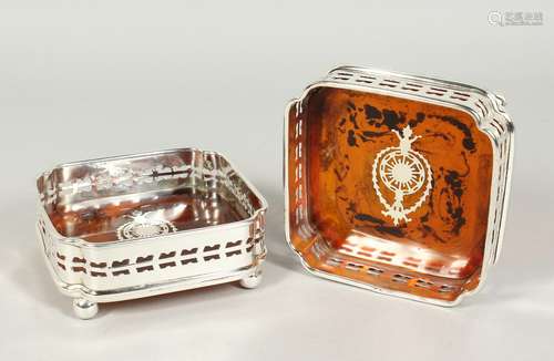 A PAIR OF PLATE AND FAUX TORTOISE SHELL SQUARE WINE COASTERS