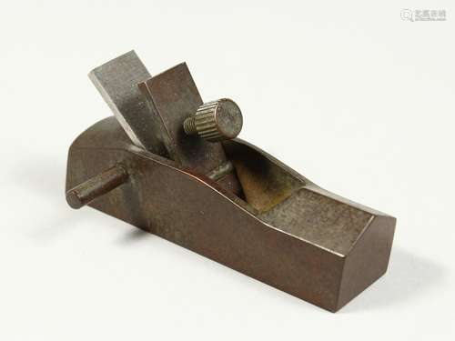 A MINIATURE BRONZE PLANE 3.25ins long