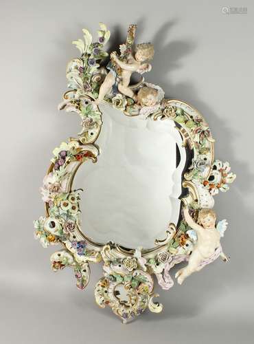 A LARGE PORCELAIN MIRROR in the MEISSEN style, encrusted wit...