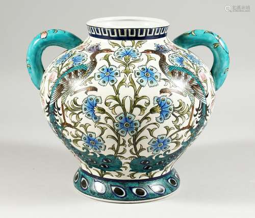 A POTTERY TWIN HANDLED BOULBOUS VASE, in the William de Morg...