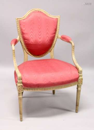 A GEORGE III SHIELD BACK ARM CHAIR with padded back arms and...