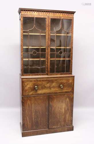 A GEORGE III MAHOGANY SECRETAIRE CUPBOARD BOOKCASE,with pend...