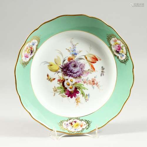 A MEISSEN PORCELAIN PLATE, with green border and vignettes o...