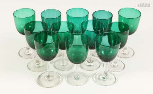 TWELVE MIXED VICTORIAN GREEN TINTED WINE GLASSES