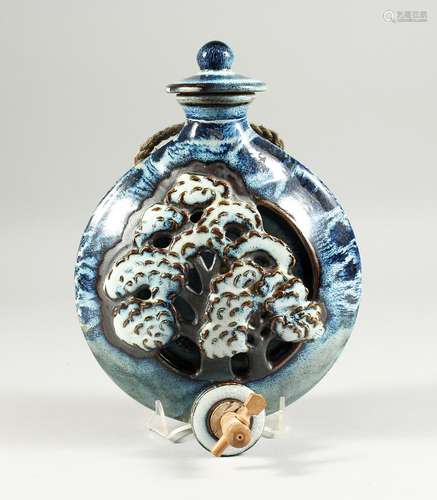 A STUDIO POTTERY WINE BOTTLE, pierced and moulded with a tre...