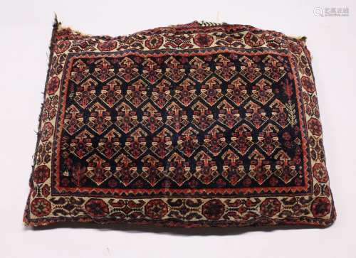 A PERSIAN CUSHION 2ft 6ins x 1ft 6ins