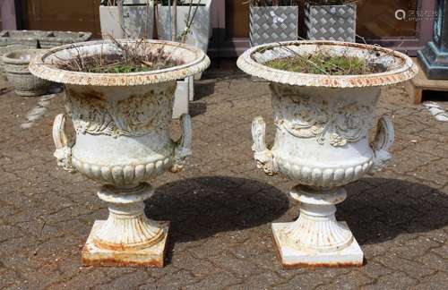 A GOOD PAIR OF VICTORIAN WHITE PAINTED CAST IRON CAMPAGA VAS...