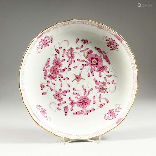 A GOOD MEISSEN CIRCULAR DEEP DISH with waved gilt edge and p...