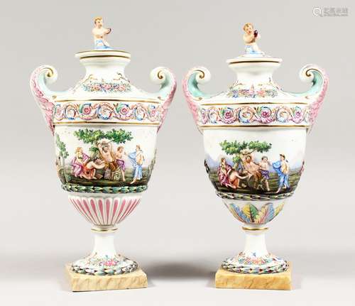 A GOOD PAIR OF CAPODIMONTE URN SHAPED, TWO HANDLED VASES AND...