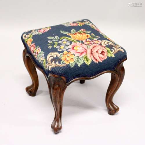 A VICTORIAN ROSEWOOD SQUARE TOP STOOL with floral needlework...