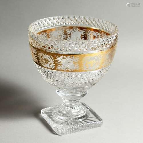 A LARGE MOSER CUT AND GILDED FRUIT BOWL on a square base. 8i...