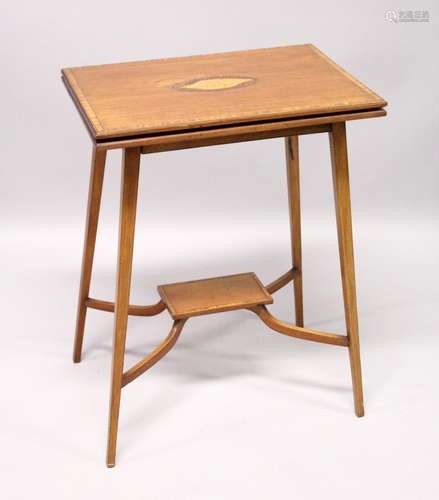 AN EDWARDIAN MAHOGANY FOLDING TOP TEA TABLE, on tapering leg...