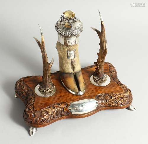 A FINE SCOTTISH SILVER MOUNTED HOOF, ANTLER AND WOOD DESK SE...