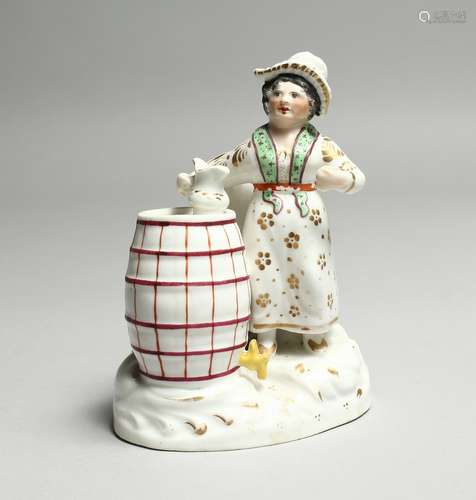 A ROCKINGHAM PORCELAIN QUILL HOLDER, young girl standing bes...