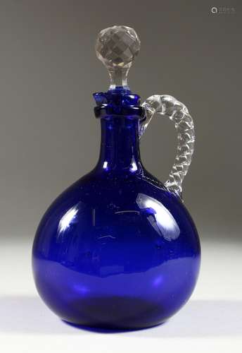 A BRISTOL BLUE CLARET JUG AND STOPPER. 8.5ins high.