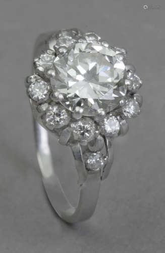 A cluster dimond ring circa 1940 with a 2,25 ct. diamonds ap...