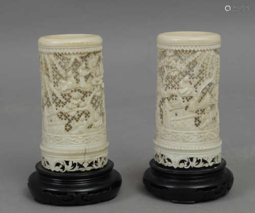A pair of Canton ivory brush pots circa 1900