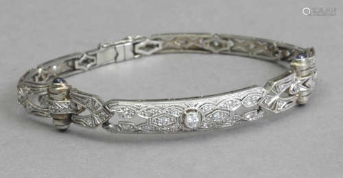 An Art-Déco bracelet circa 1920. Diamonds, sapphires, gold a...