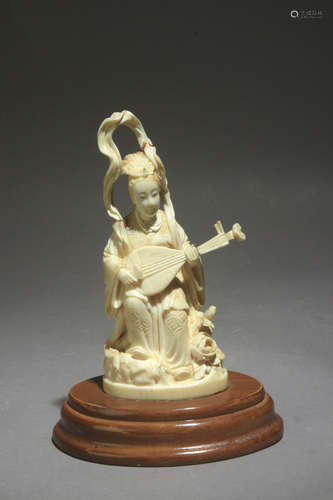 A Japanese okimono circa 1900 in walrus ivory